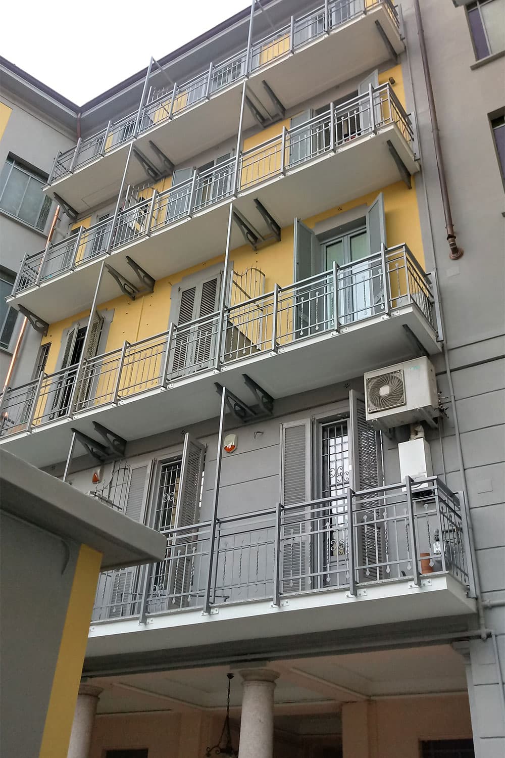 Cantiere in Via Marcello Malpighi, Milano. Riqualificazione prospetti di facciata lato cortile. Dopo i lavori